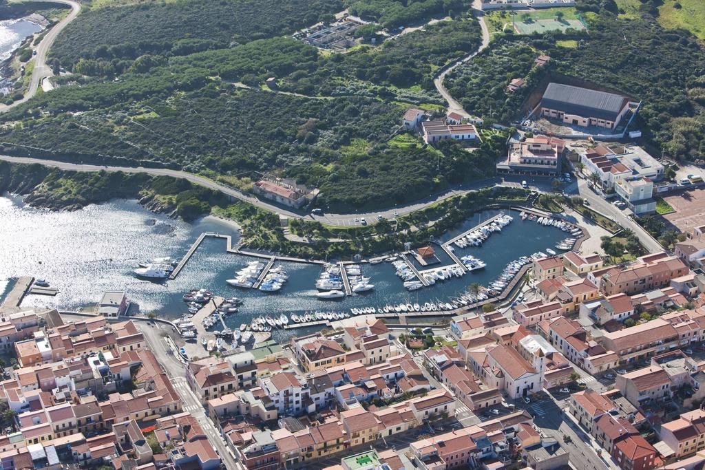 Hotel Cala Reale Stintino Bagian luar foto