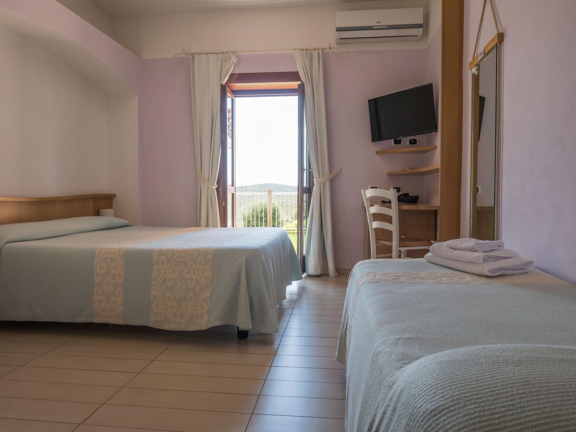 Hotel Cala Reale Stintino Bagian luar foto