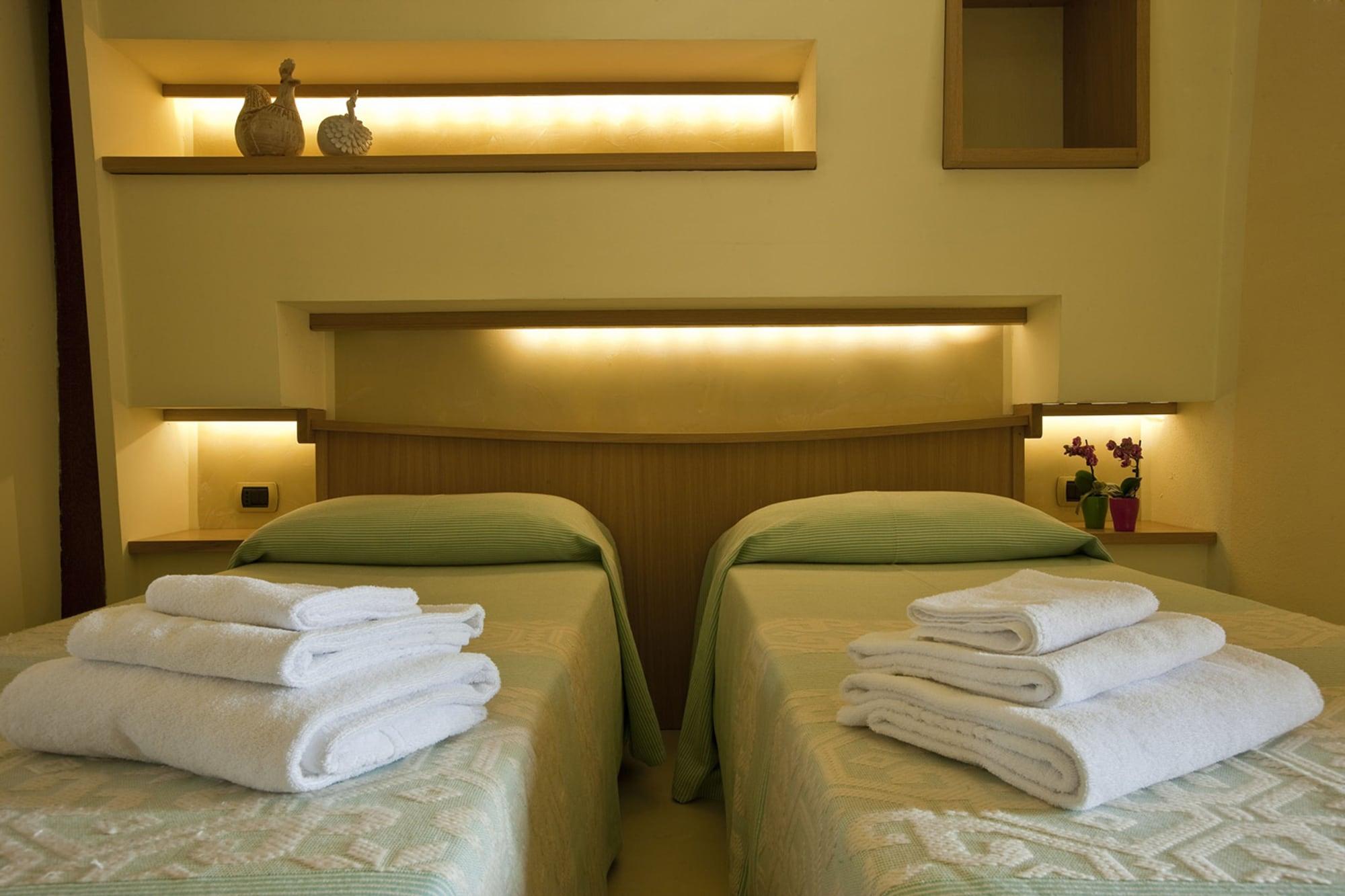 Hotel Cala Reale Stintino Bagian luar foto