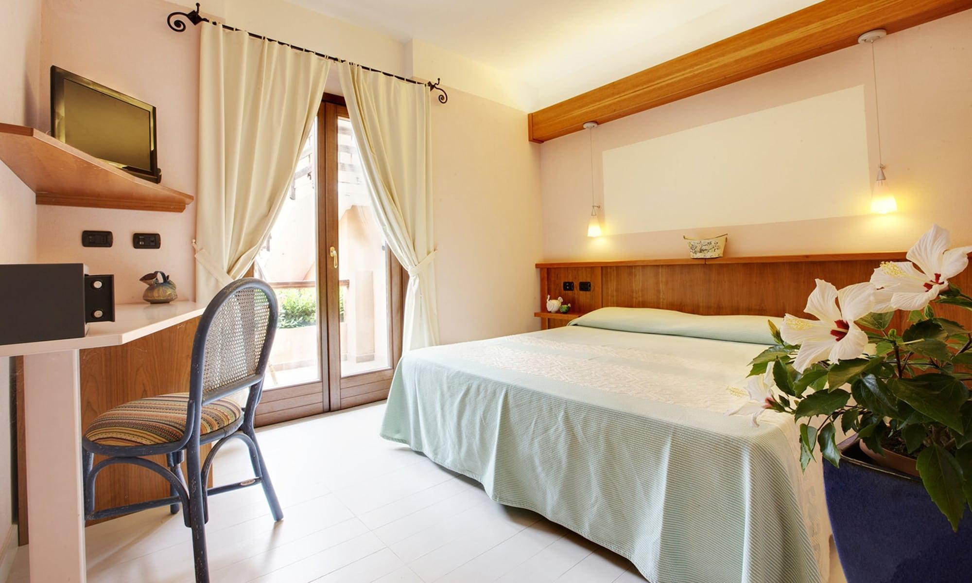 Hotel Cala Reale Stintino Bagian luar foto