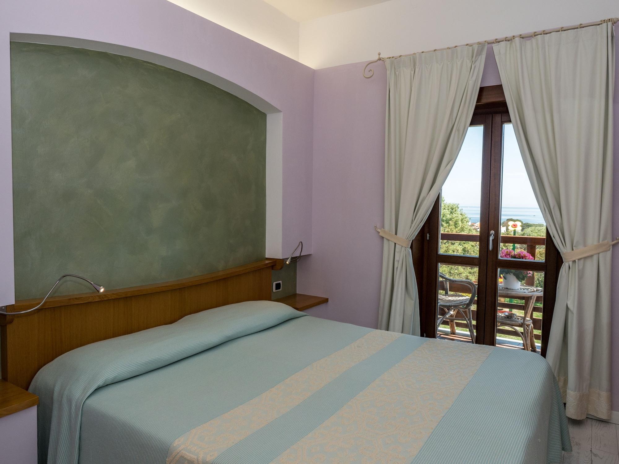 Hotel Cala Reale Stintino Bagian luar foto