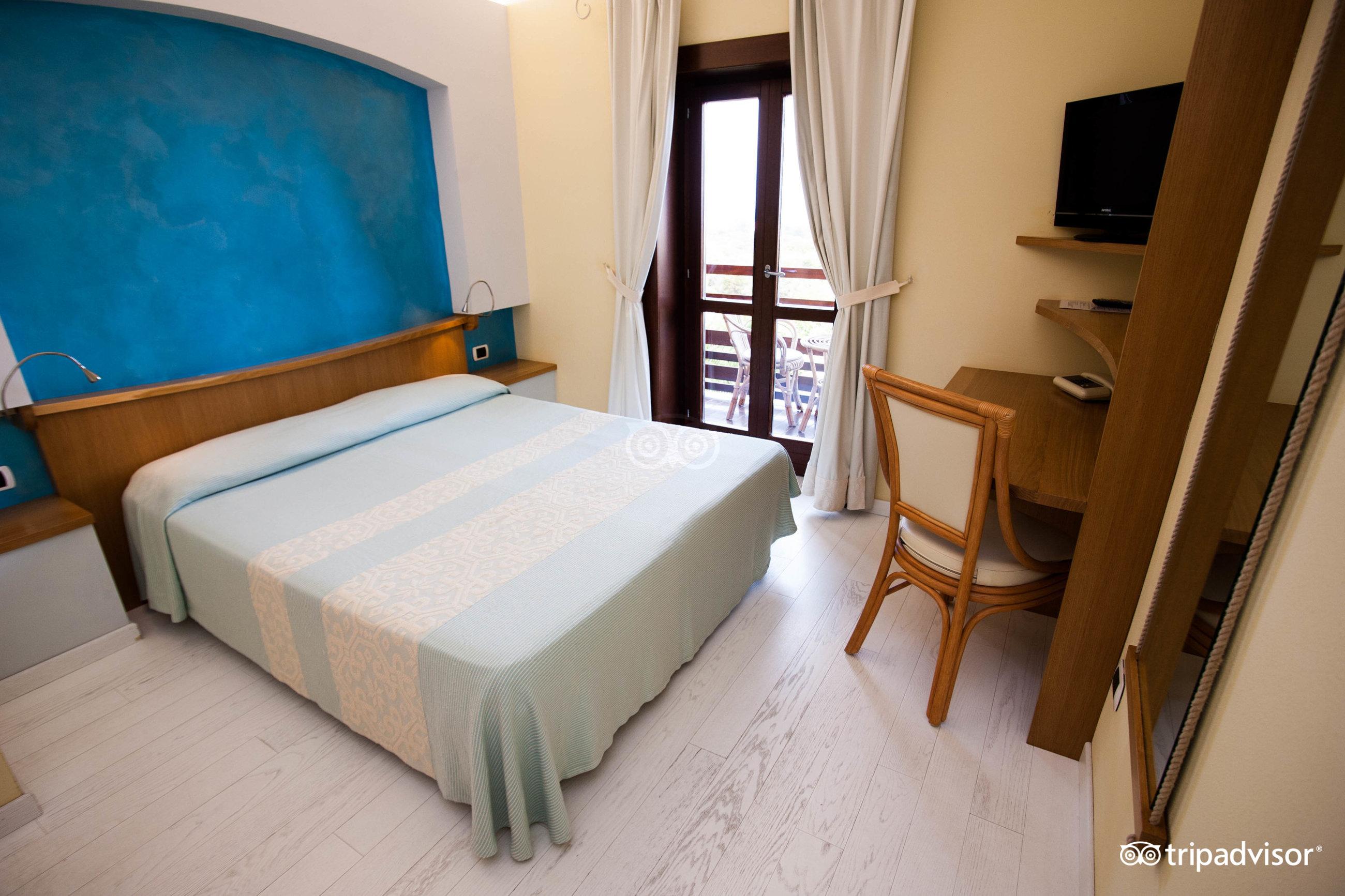 Hotel Cala Reale Stintino Bagian luar foto