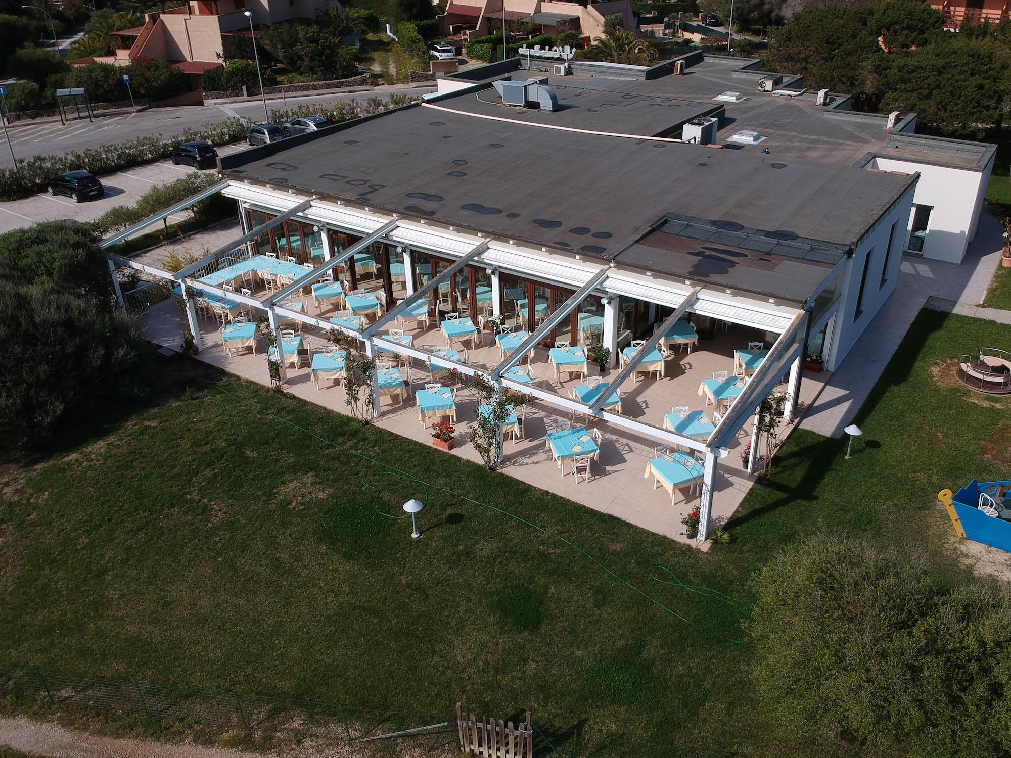 Hotel Cala Reale Stintino Bagian luar foto