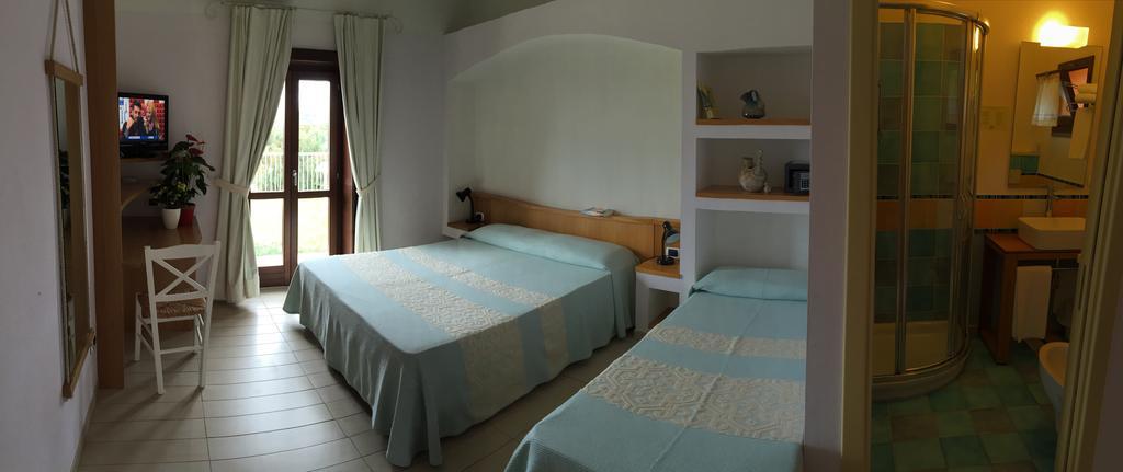 Hotel Cala Reale Stintino Bagian luar foto
