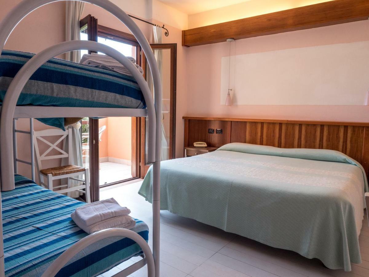Hotel Cala Reale Stintino Bagian luar foto